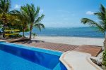 Pool side with wooden deck